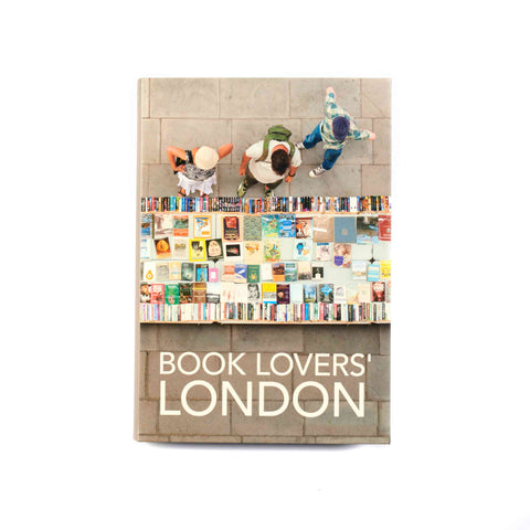 Book cover for Book Lovers' London which features an overhead image of three people looking at a book stall.