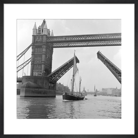 Tower Bridge open to allow the 'Sir Alan Herbert' to sail through