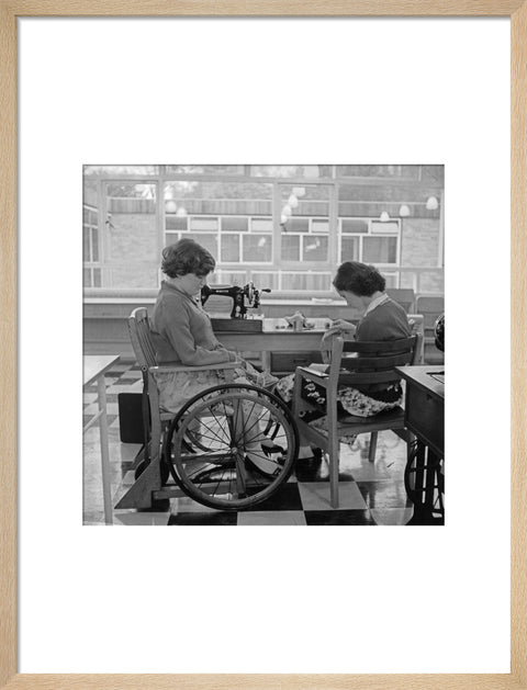 Two children at the 'FDR School for Handicapped Children', Hampstead, working in the handicraft room
