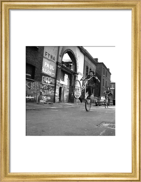Teenagers on bicycles