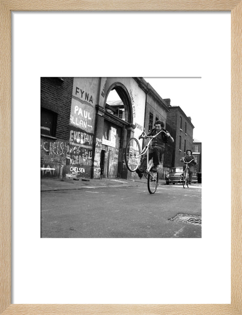 Teenagers on bicycles