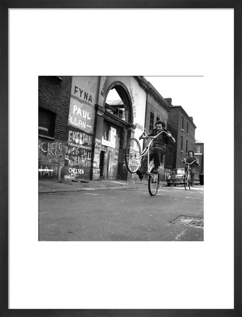 Teenagers on bicycles