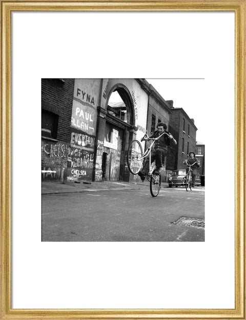 Teenagers on bicycles