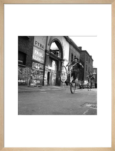 Teenagers on bicycles
