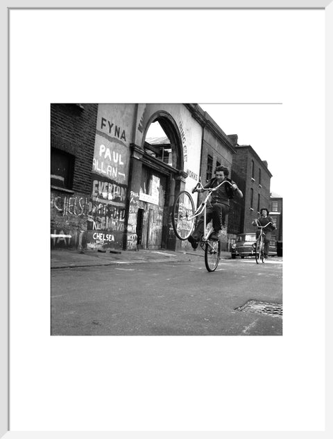 Teenagers on bicycles
