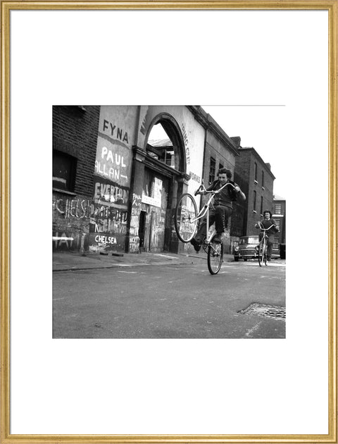 Teenagers on bicycles