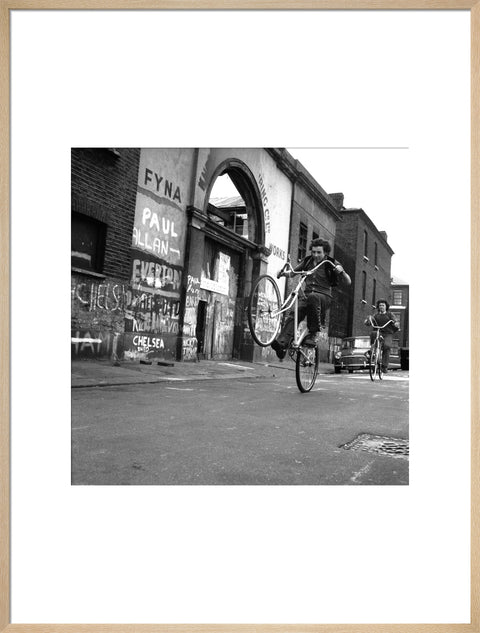 Teenagers on bicycles