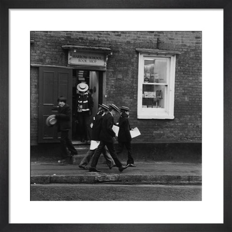 Schoolboys outisde the Harrow School Book Shop