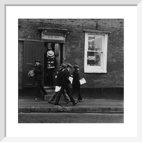Schoolboys outisde the Harrow School Book Shop