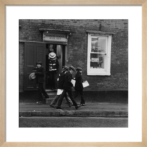 Schoolboys outisde the Harrow School Book Shop