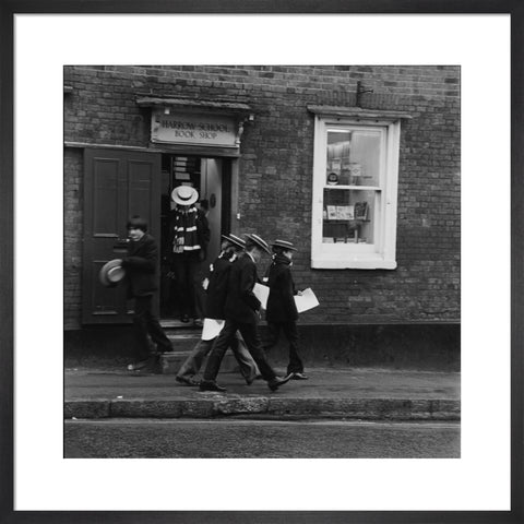 Schoolboys outisde the Harrow School Book Shop