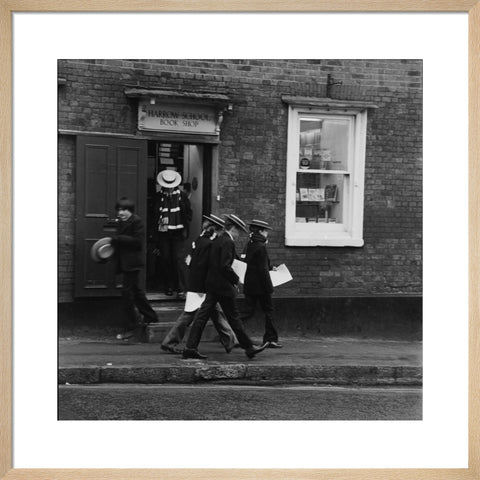Schoolboys outisde the Harrow School Book Shop
