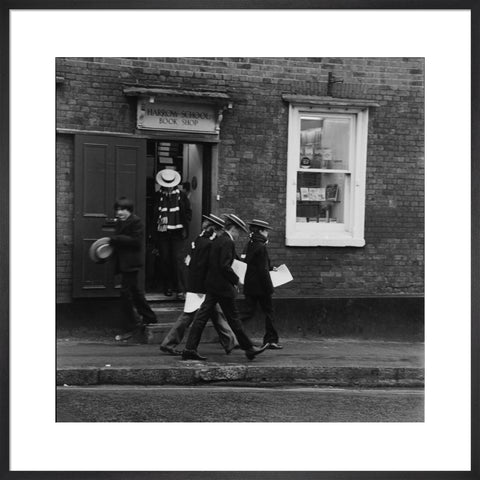 Schoolboys outisde the Harrow School Book Shop
