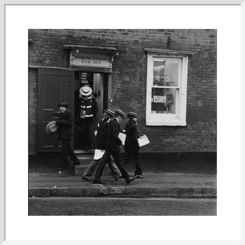 Schoolboys outisde the Harrow School Book Shop