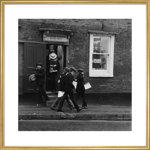 Schoolboys outisde the Harrow School Book Shop