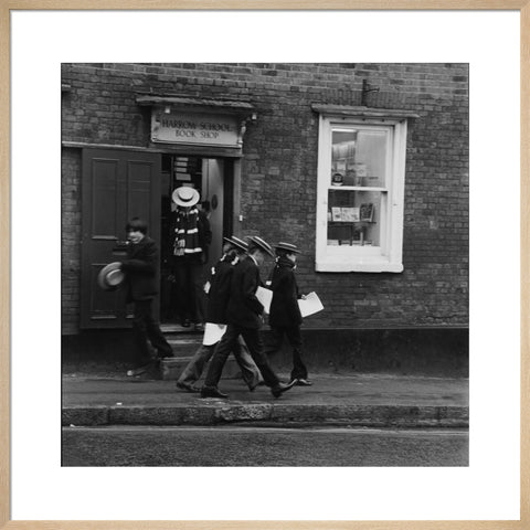 Schoolboys outisde the Harrow School Book Shop