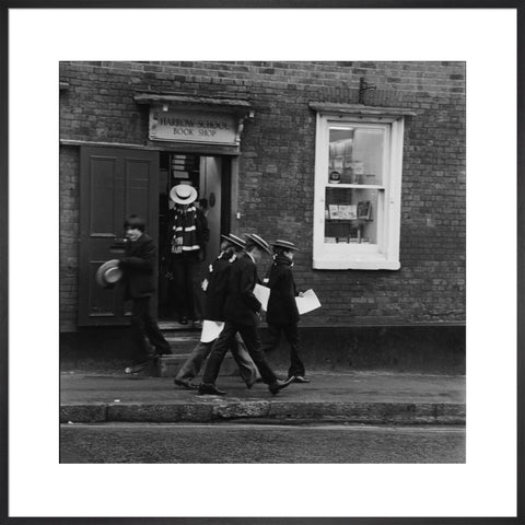 Schoolboys outisde the Harrow School Book Shop