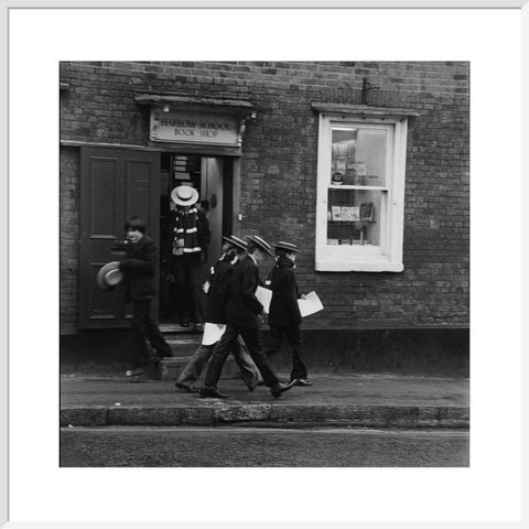 Schoolboys outisde the Harrow School Book Shop