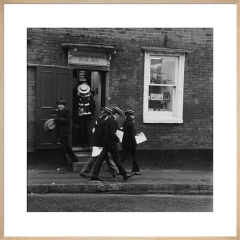 Schoolboys outisde the Harrow School Book Shop