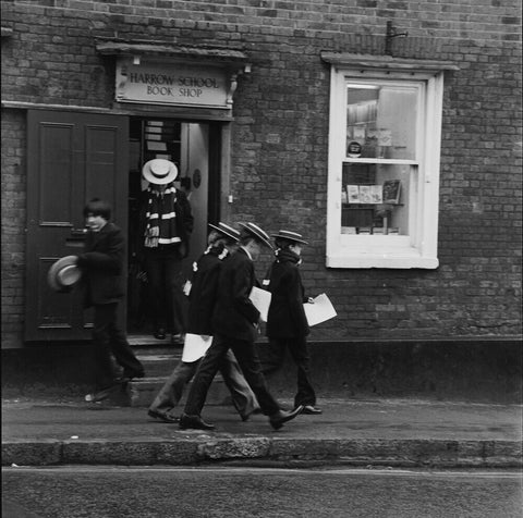 Schoolboys outisde the Harrow School Book Shop