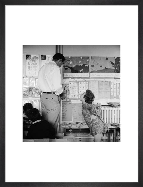 Girl sticking her tongue out at the teacher.