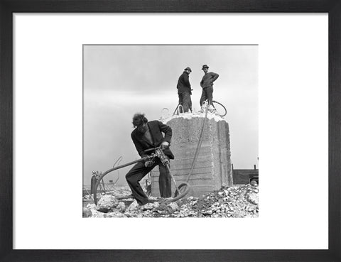 Three men working on a building site.