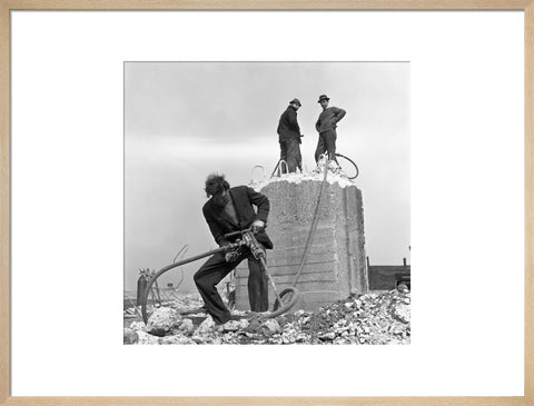 Three men working on a building site.