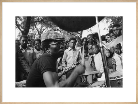 Band playing music to crowd at fun fair, Brent Cross 1973