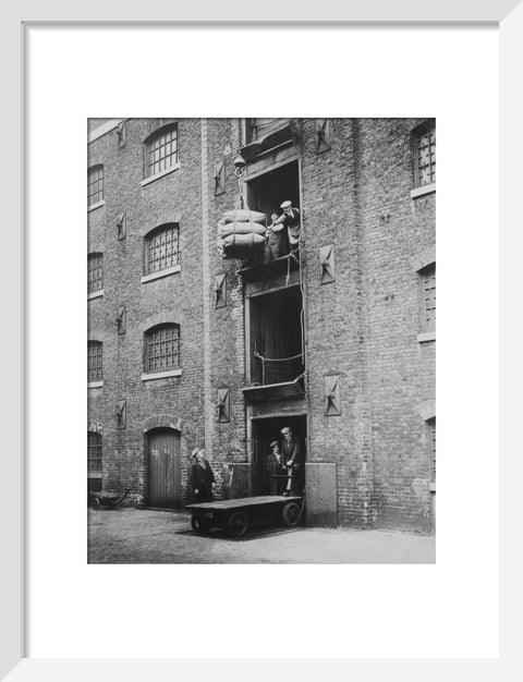 West India Docks 1900 Sugar being hoisted into warehouses