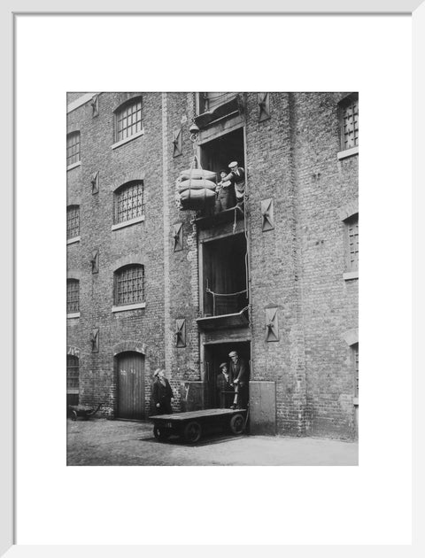 West India Docks 1900 Sugar being hoisted into warehouses