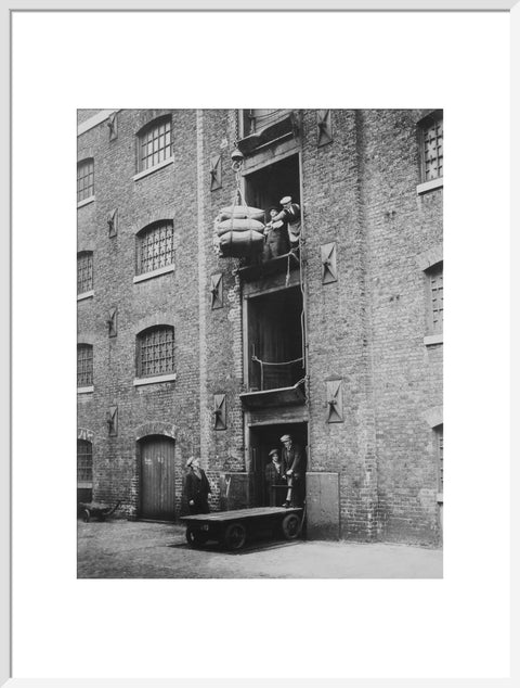 West India Docks 1900 Sugar being hoisted into warehouses