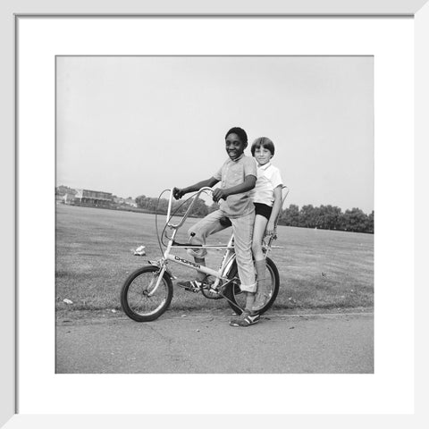 Two boys riding a bicycle 1973