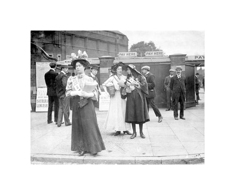 Suffragettes selling Votes for Women at Oval Cricket Ground entrance1908