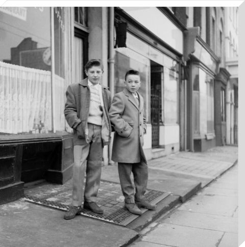 Two young 'teddy boys' pose in the street 1960
