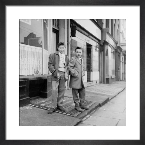 Two young 'teddy boys' pose in the street 1960