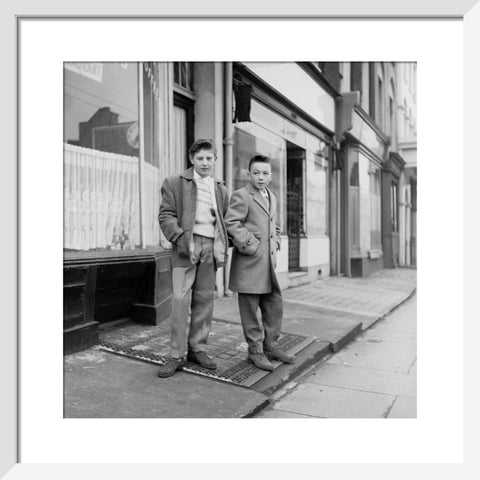 Two young 'teddy boys' pose in the street 1960