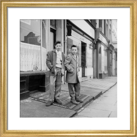 Two young 'teddy boys' pose in the street 1960