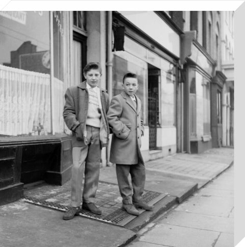 Two young 'teddy boys' pose in the street 1960