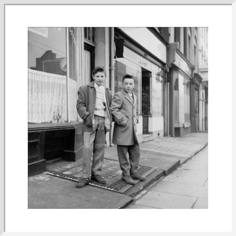Two young 'teddy boys' pose in the street 1960