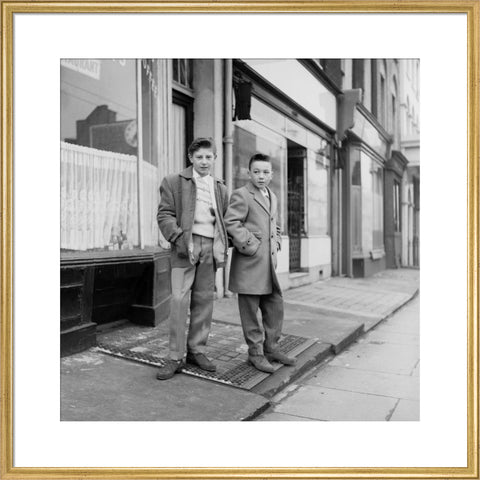 Two young 'teddy boys' pose in the street 1960