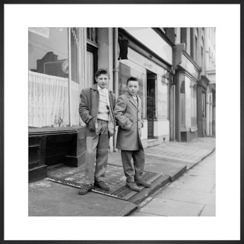Two young 'teddy boys' pose in the street 1960