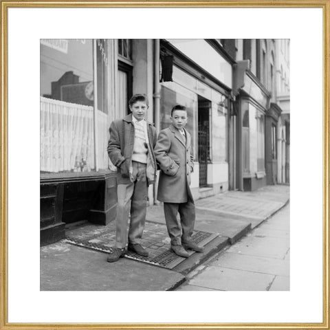 Two young 'teddy boys' pose in the street 1960
