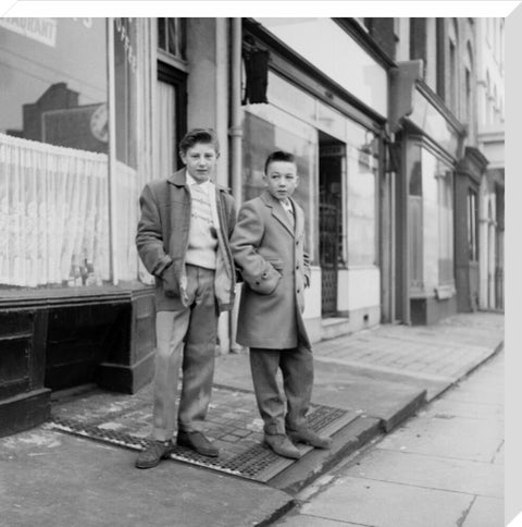 Two young 'teddy boys' pose in the street 1960