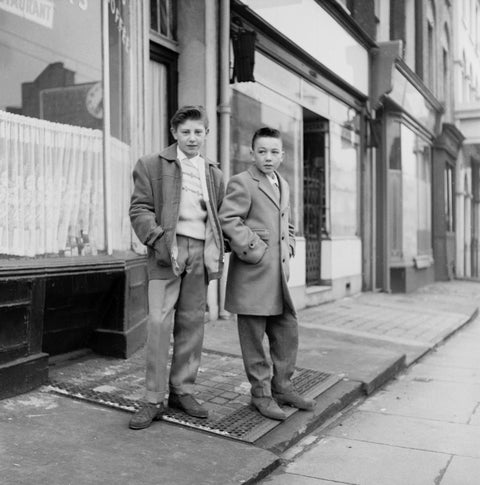 Two young 'teddy boys' pose in the street 1960