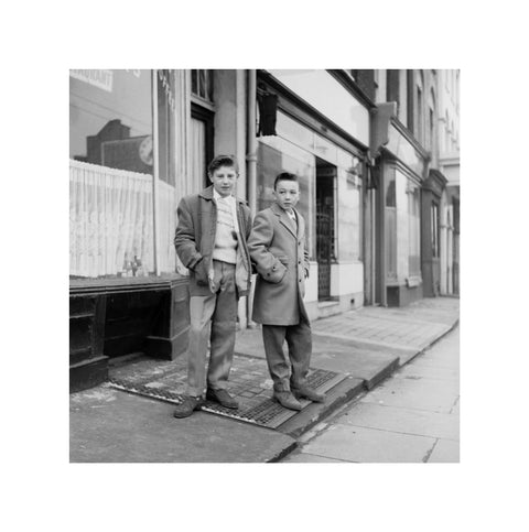 Two young 'teddy boys' pose in the street 1960