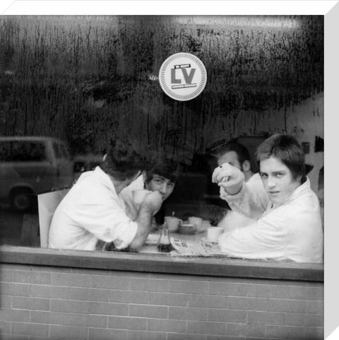 Four men in a cafe in Smithfield Market. c.1965