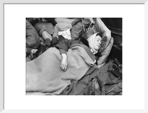 A woman camps out on the street for Queen Elizabeth's Coronation 1953