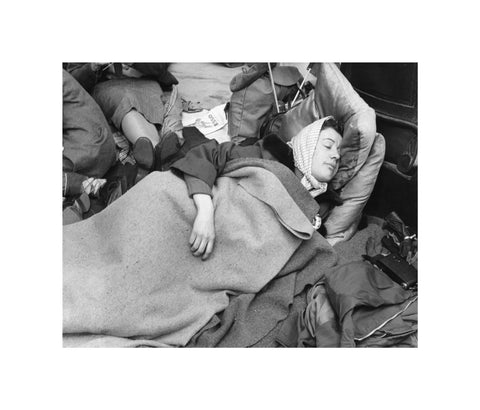 A woman camps out on the street for Queen Elizabeth's Coronation 1953