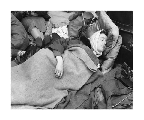 A woman camps out on the street for Queen Elizabeth's Coronation 1953