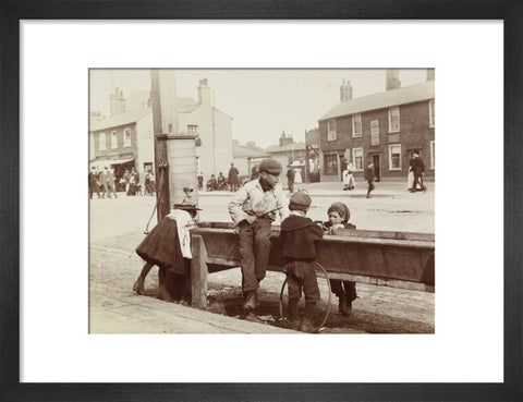 Children Children playing at a water trough in Barnet High Street c.1900